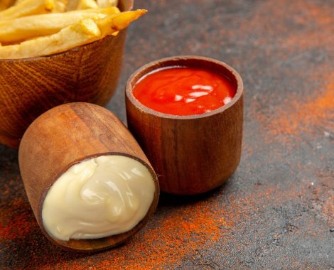close-up-view-of-fallen-mayonnaise-bowl-and-ketchu-ANGFMUT